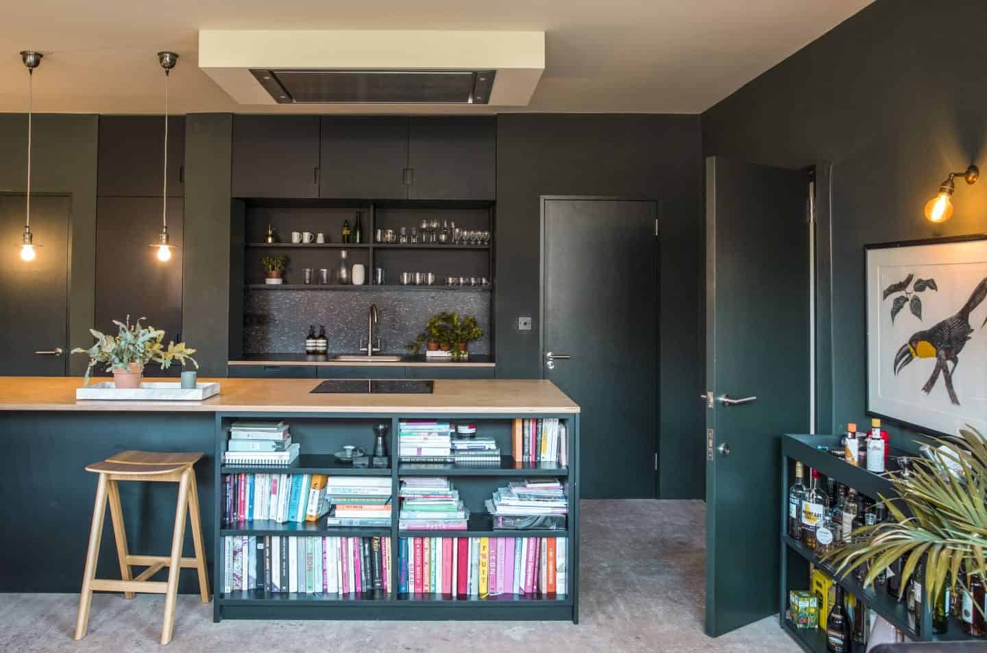 Image from the book Love Colour ©annastarmer - a dark grey kitchen with wood topped island.