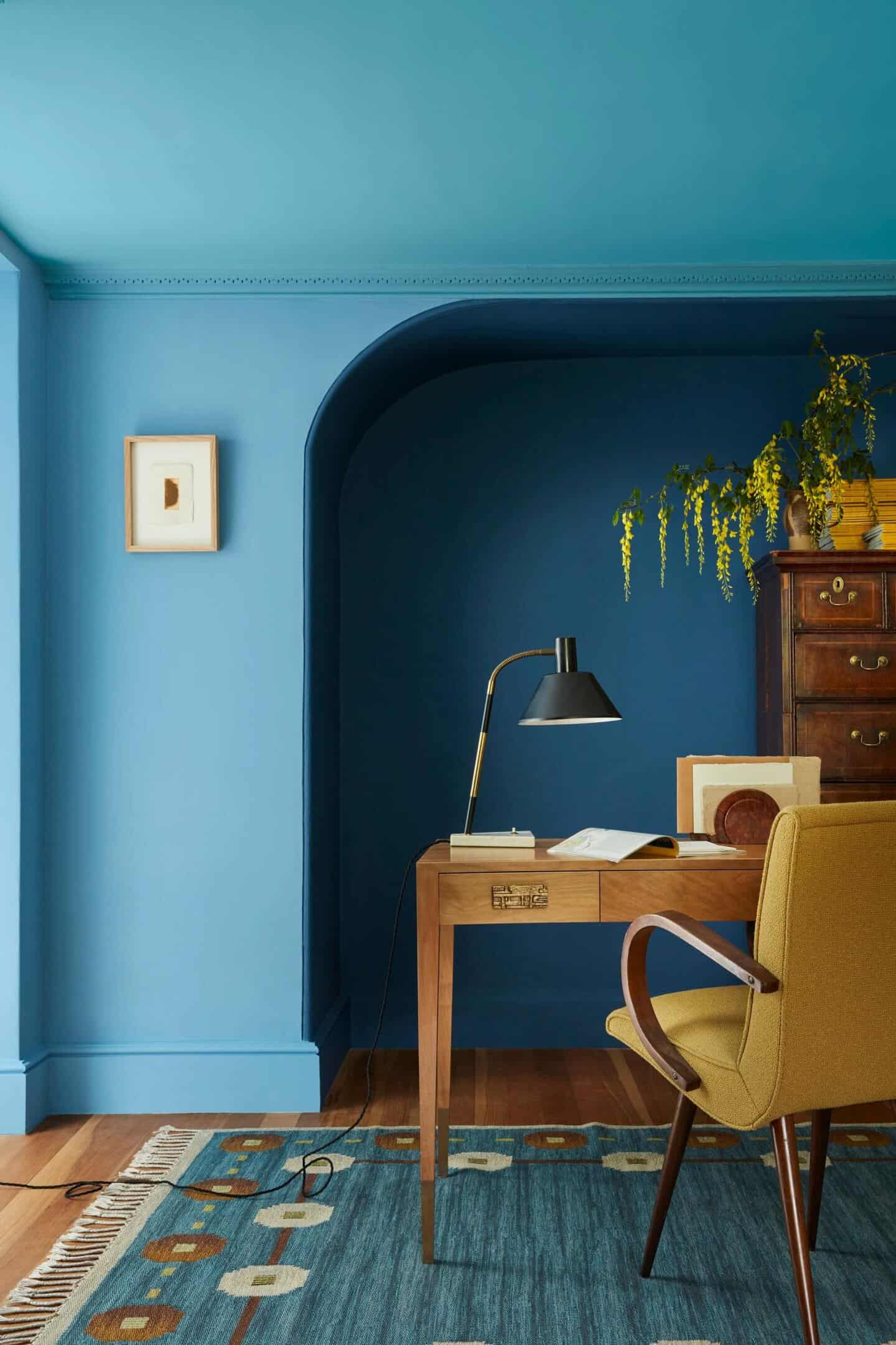 Double-drenched home office painted in blue paint from little Greene