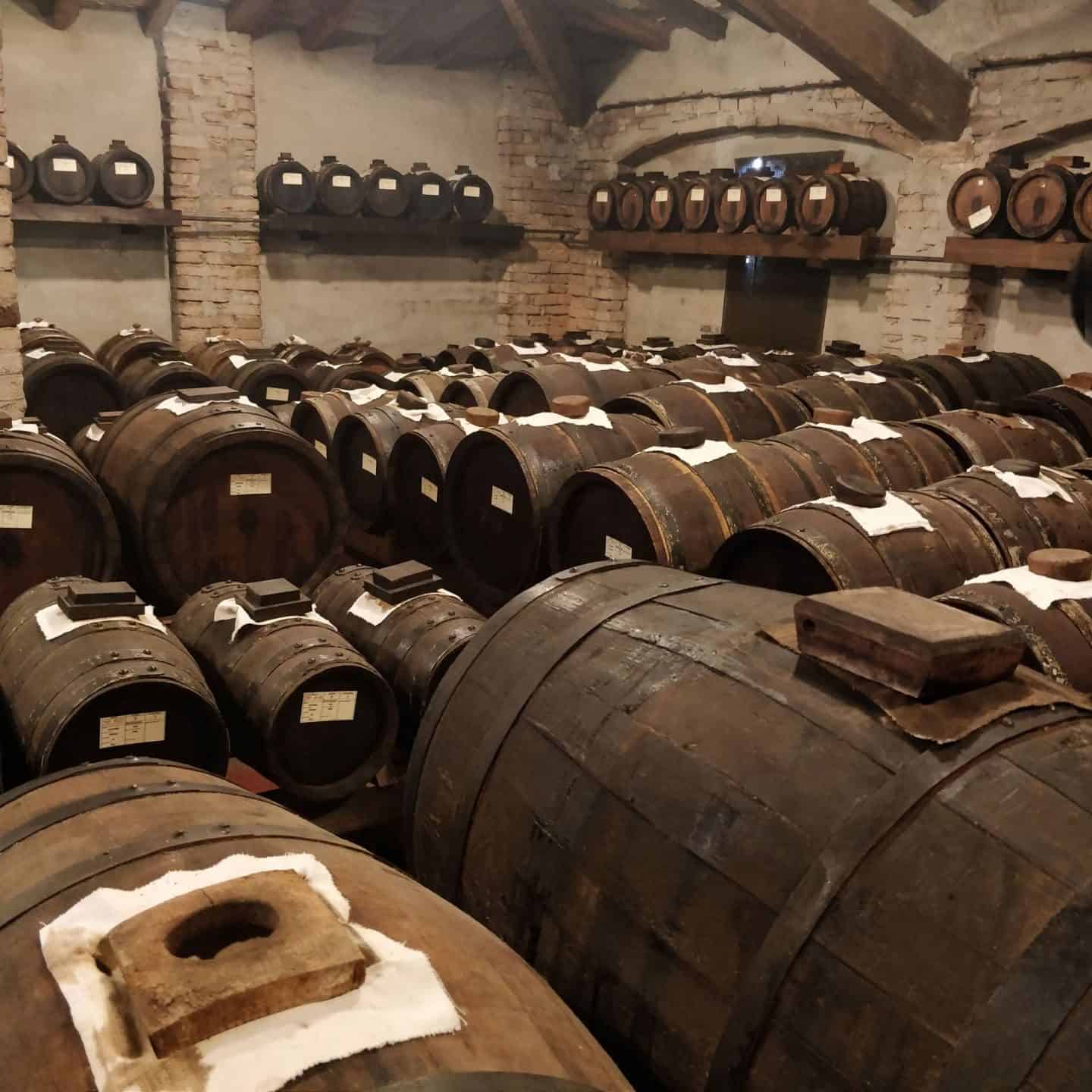 Casks of balsamic vinegar maturing in the loft space of a balsamic vinegar factory in Italy