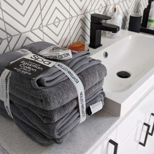 Egytian Cotton Bath Towels bundle in top of a bathroom vanity unit