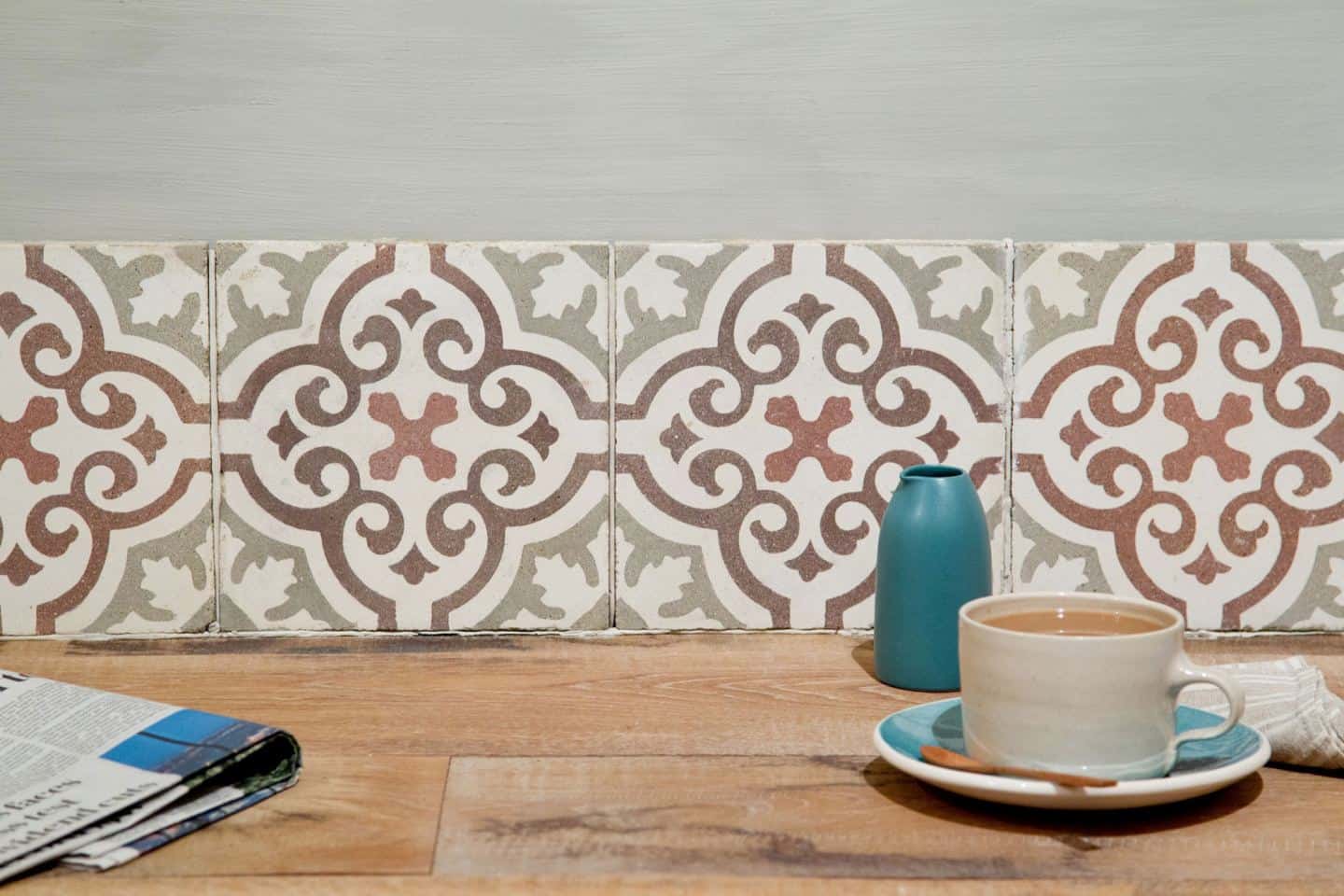 Reclaimed or antique tiles used as a kitchen splashback -Maitland & Poate