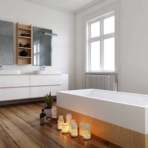 Radiator Buying Guide - Bathroom featuring cast iron radiators below the windows