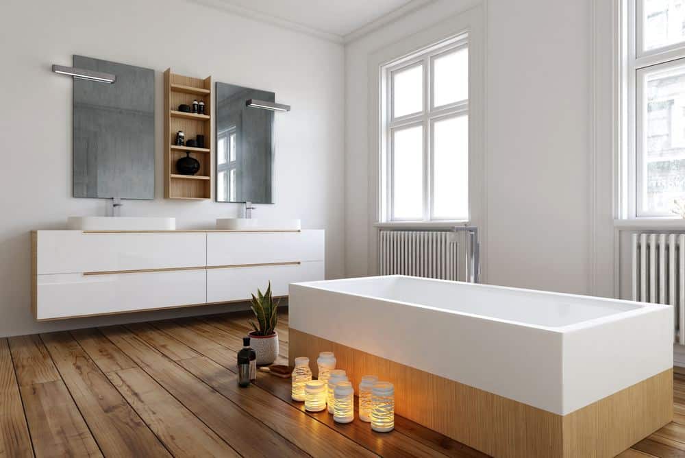 Radiator Buying Guide - Bathroom featuring cast iron radiators below the windows