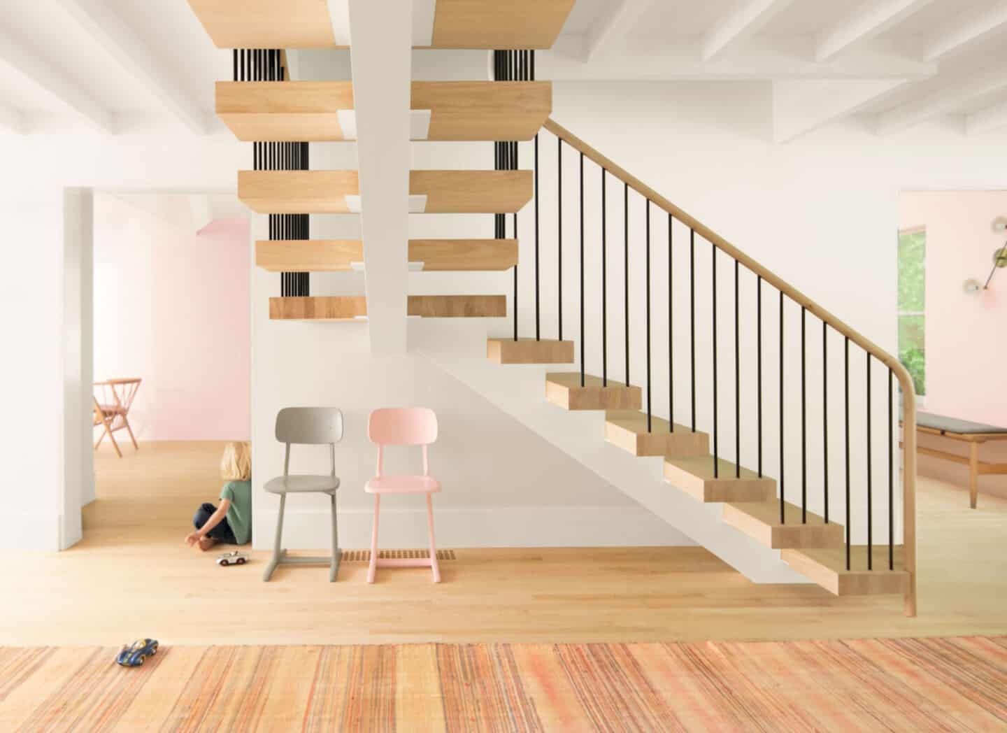 A floating wooden staircase that twists back on itself