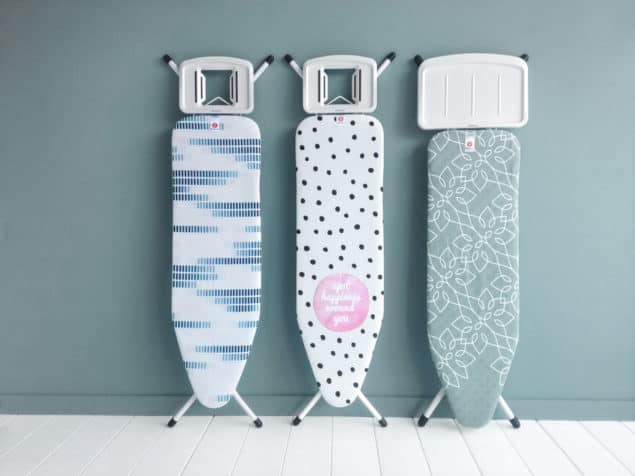 3 Brabantia Ironing Boards leaning against a wall