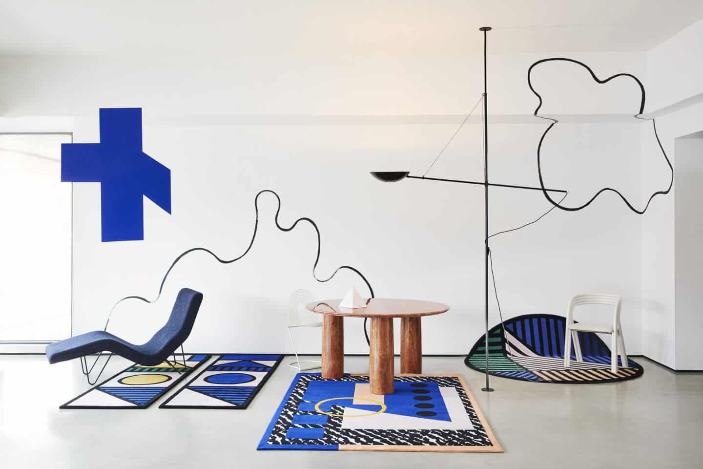 Designer rugs from Floor Story. The Camille Walala collection displayed in a white studio setting.