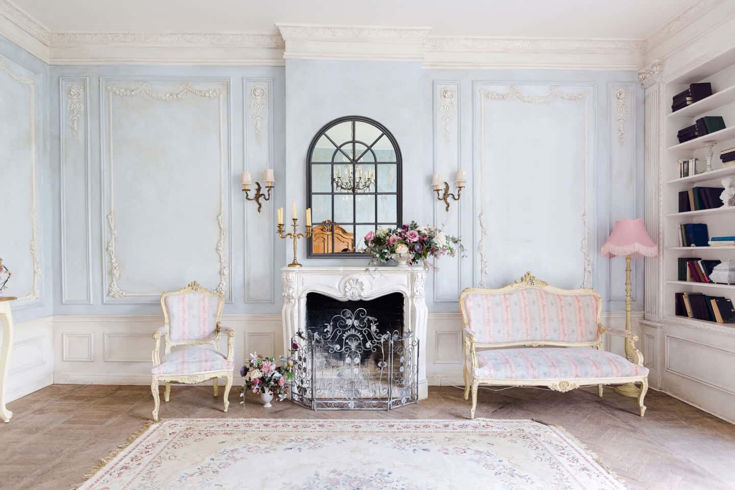 8 ways to use mirrors in your interiors. Casa Chic Boutique window mirror in  black hung above the fireplace in a french chateau style interior.