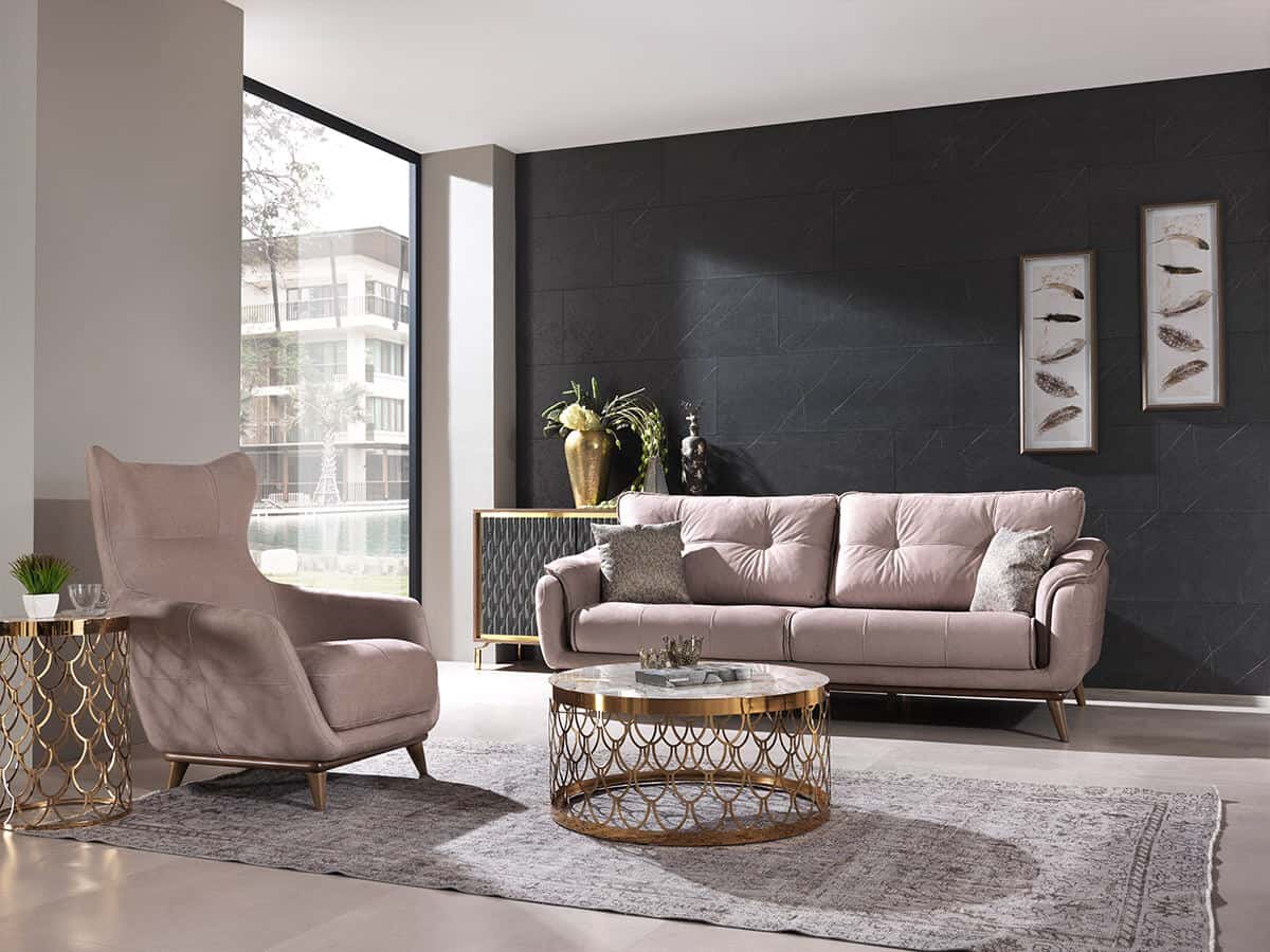 How to choose the perfect sofa for your lifestyle.  Sofa and chair arranged around a rug with coffee table on top.