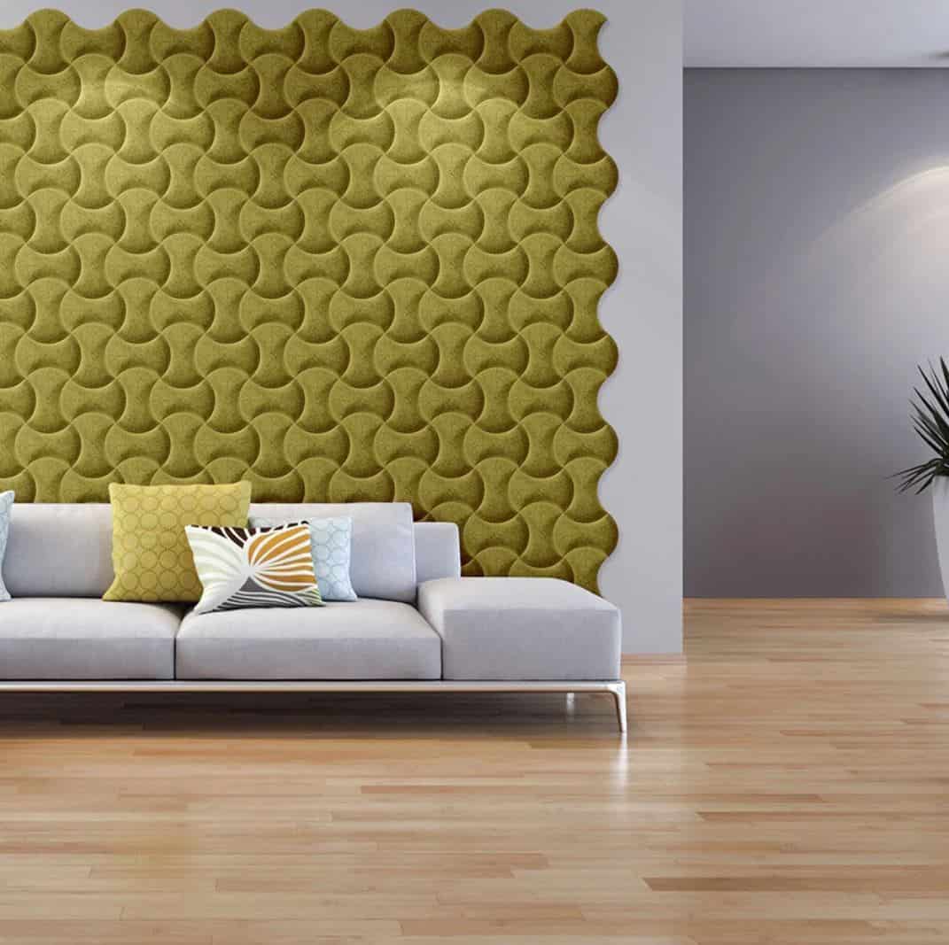 Cork acoustic panels on a wall behind a sofa