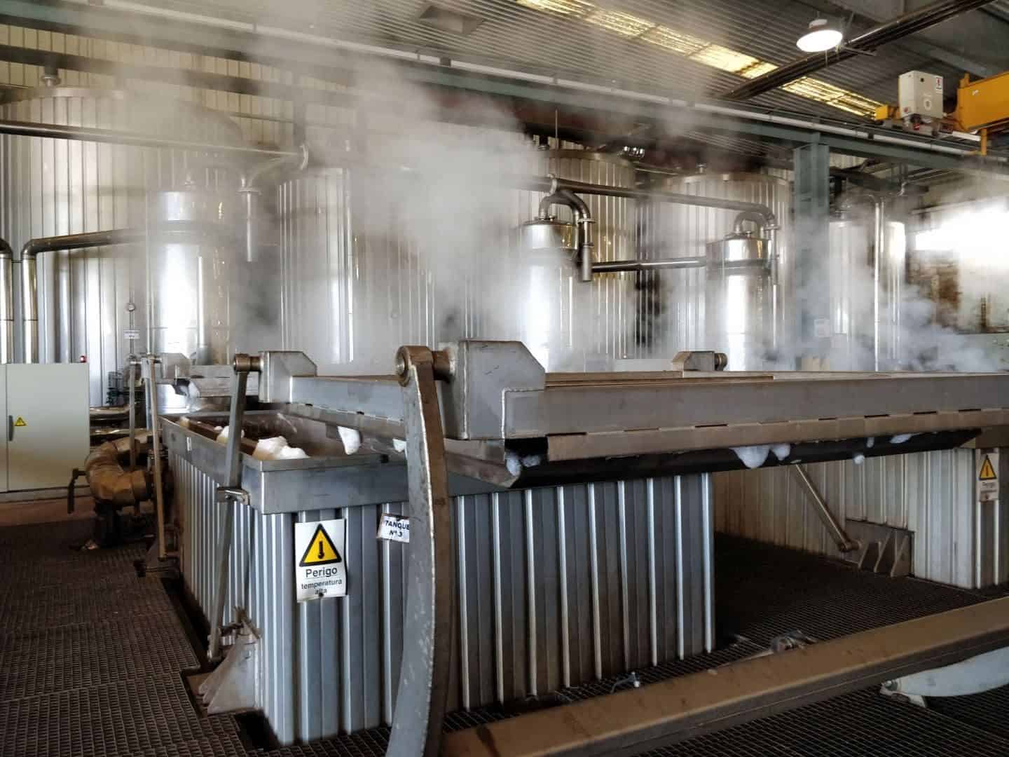 Part of the cork production process when making wine stoppers is to immerse the cork bark in boiling water