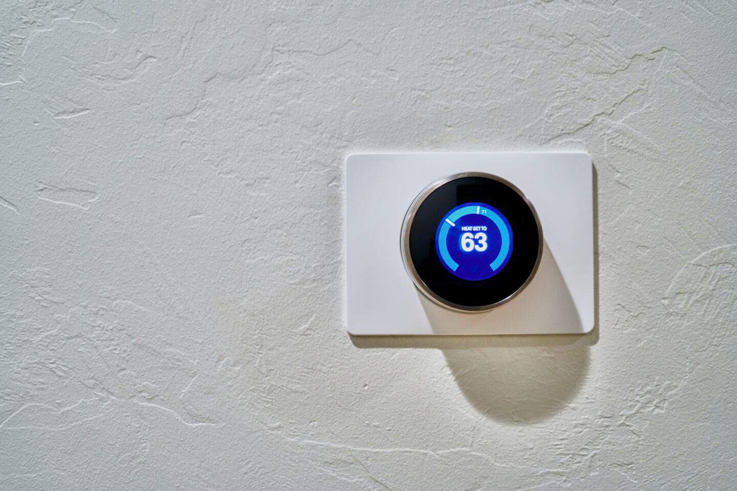 A smart thermostat in a sustainable home