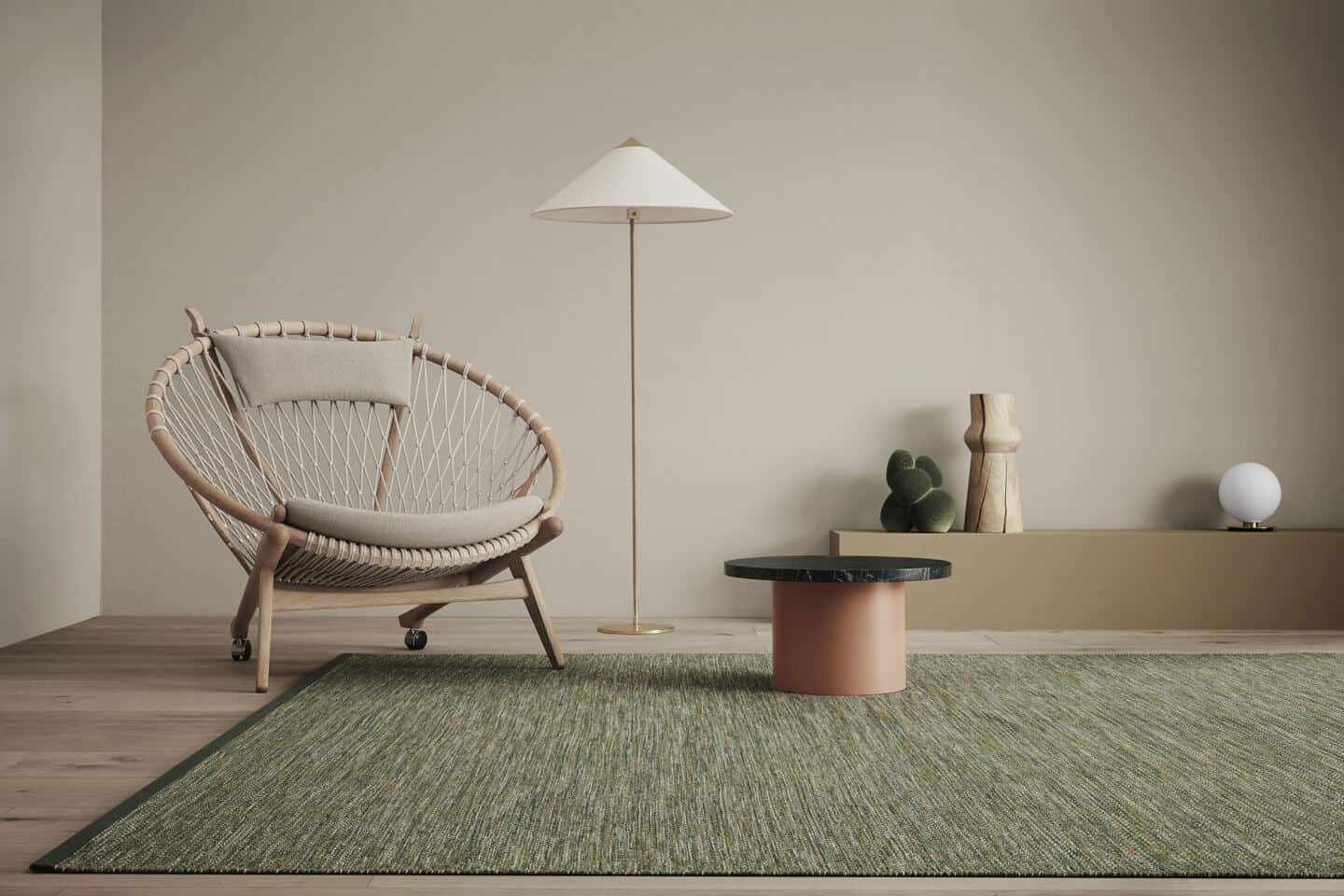 A living room scene featuring chair, table and lamp inspired by nature to create a biophilic home