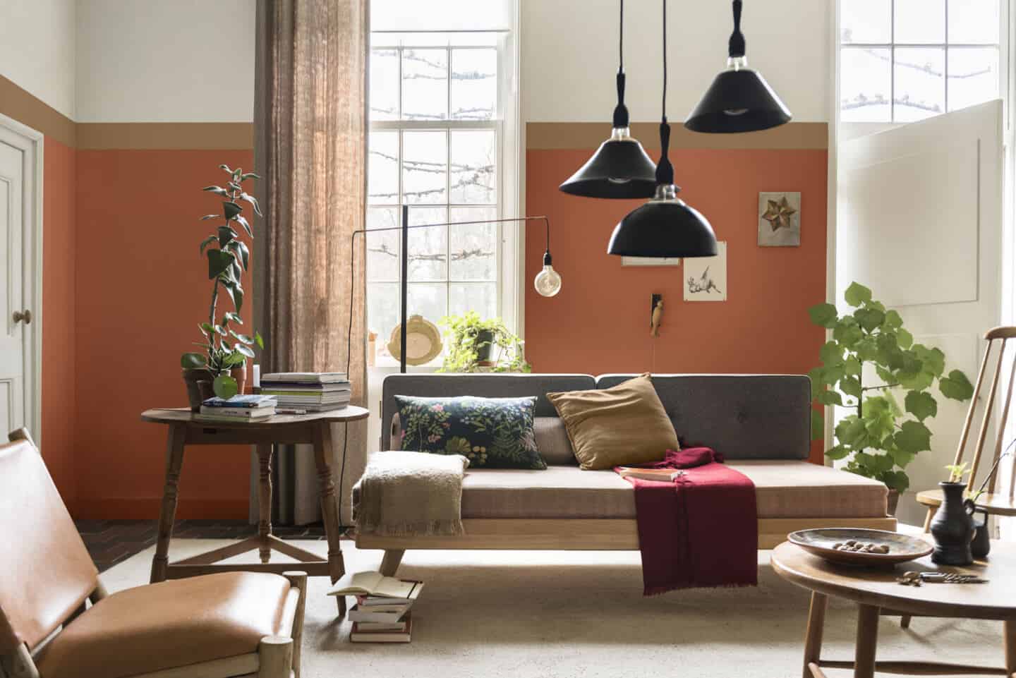 Autumnal Hues in interiors - Dulux colour of th eyear 2019 spiced honey painted as a border around the top of a living room wall.