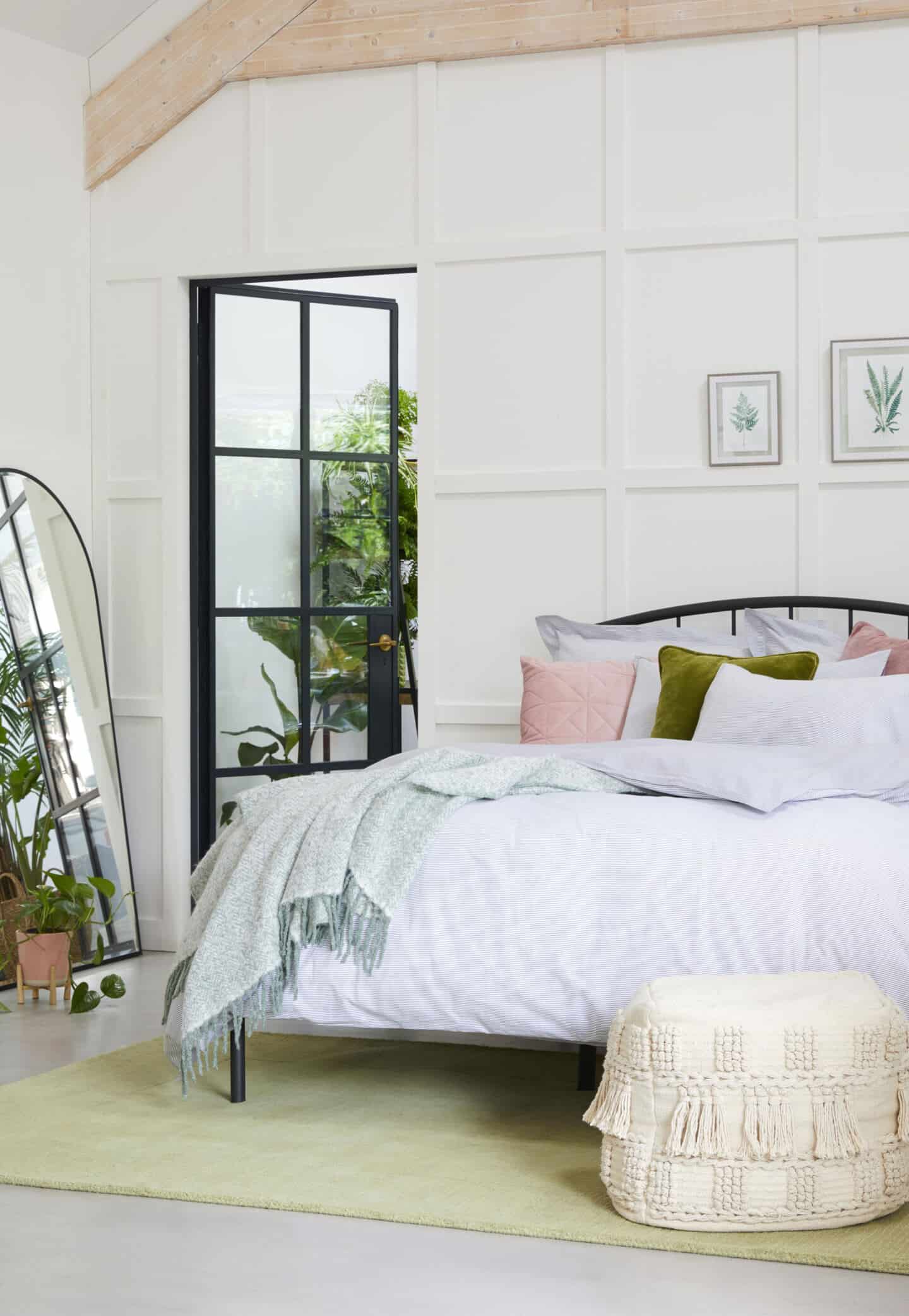 Sancturary is a SS20 interiors trend by Dunelm that features nature in interiors. This bedroom features lots of tactile textures, natural materials and plants.