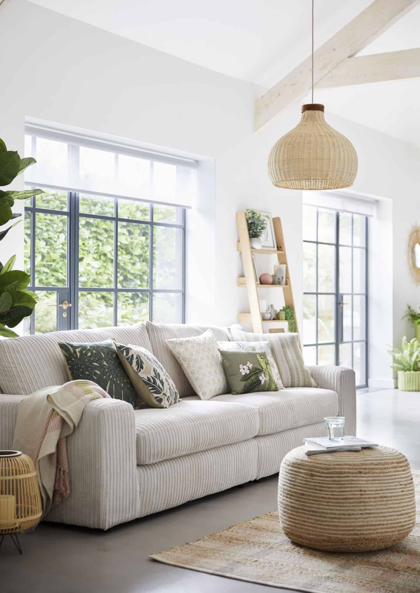 Sancturary is a SS20 interiors trend by Dunelm that features nature in interiors. This living room features lots of tactile textures, natural materials and leafy green prints.