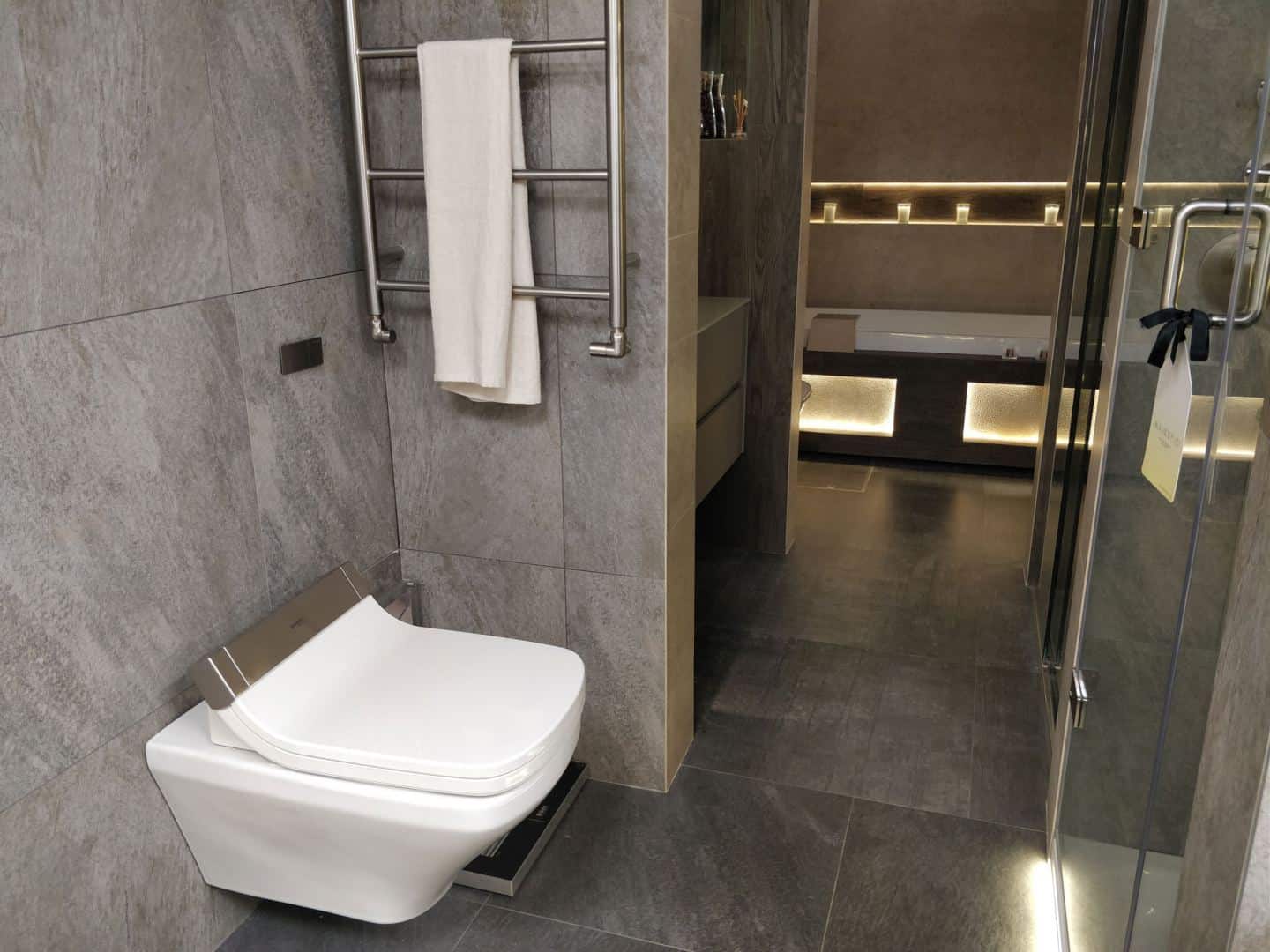 A Duravit SensoWash shower toilet on display inside premium bathroom showroom, The Showroom Ltd