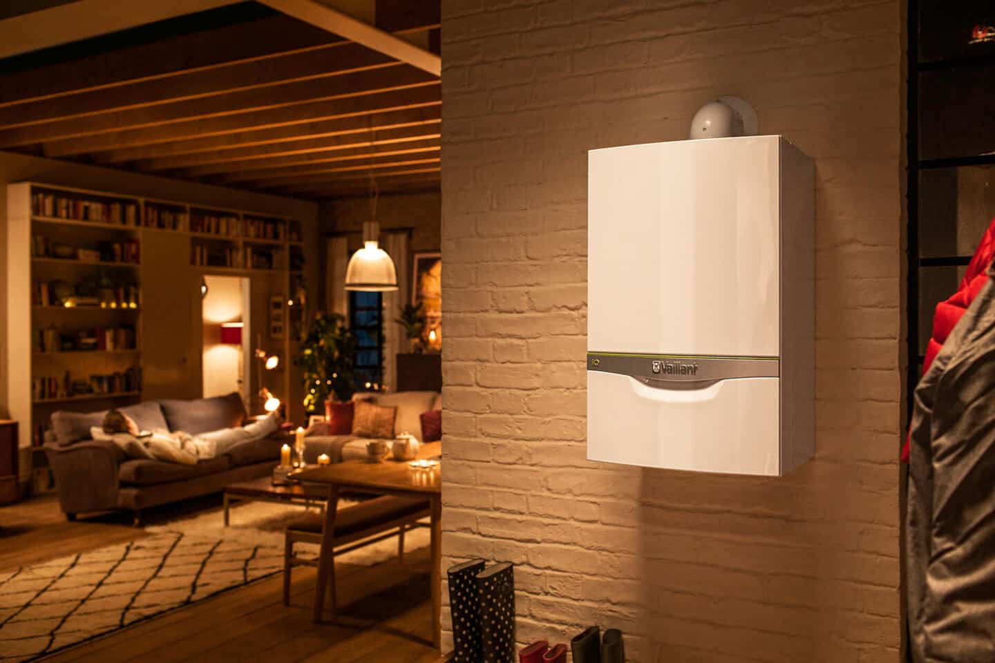 A boiler mounted on the wall in a modern open plan home