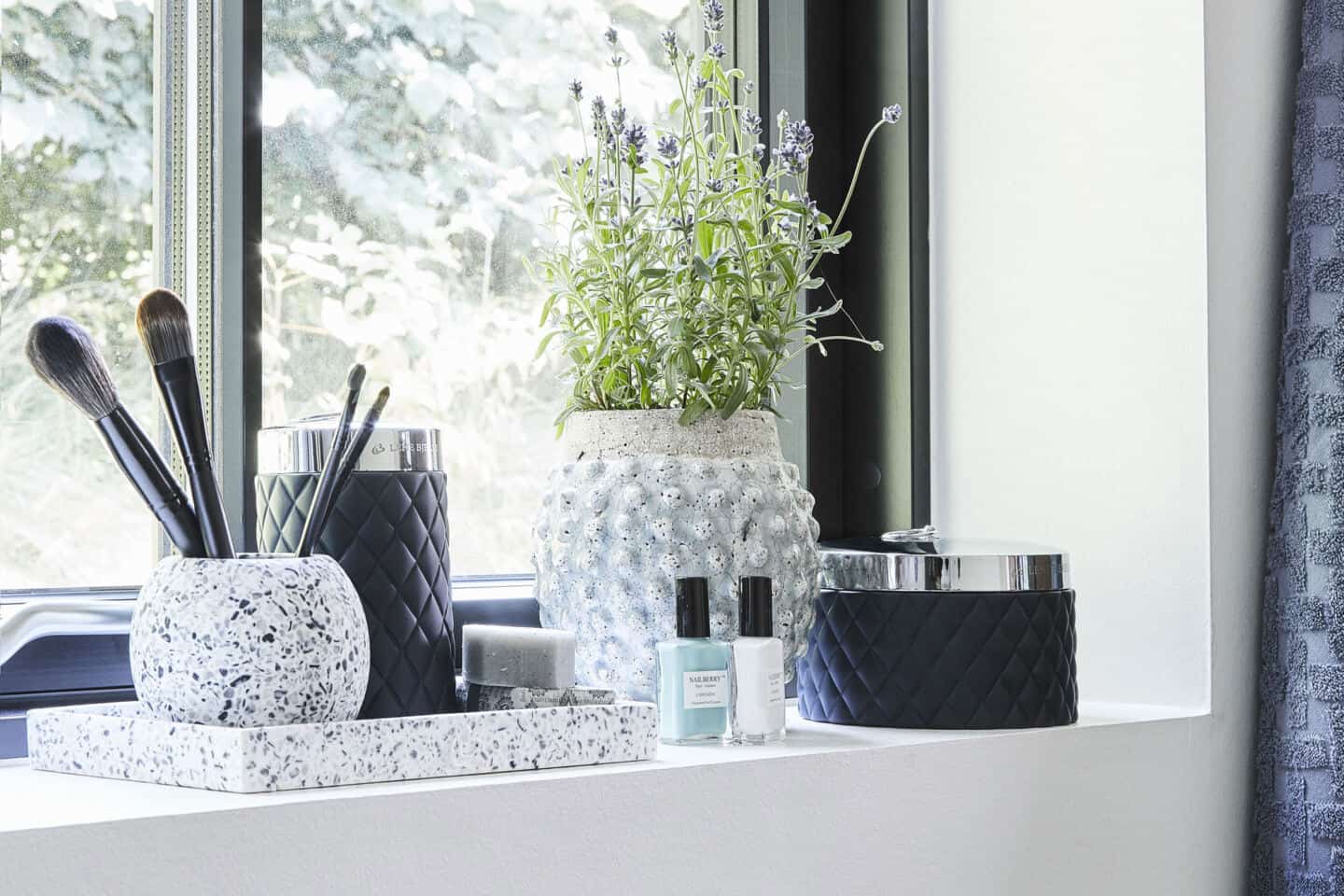 Accessories are a great way to bring texture into the bathroom