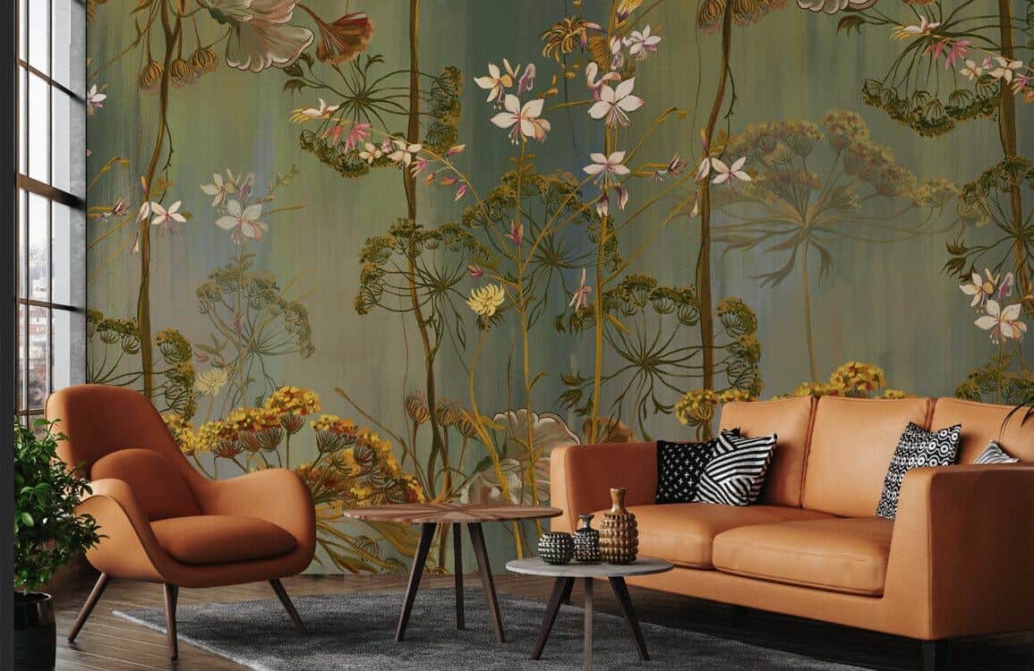 Floral wall mural from Ever Wallpaper behind a brown leather sofa and chair and two small round coffee tables