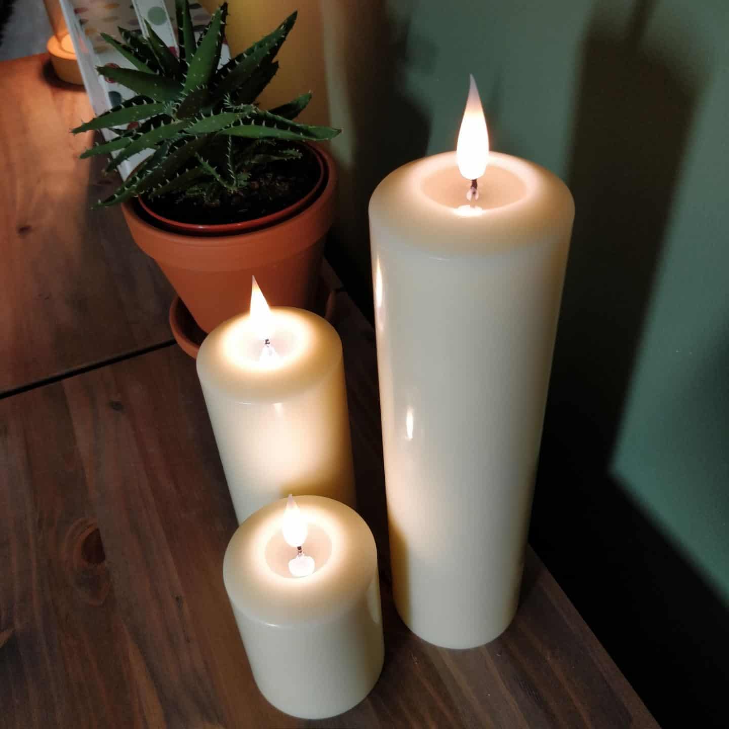 Realistic LED candles from Candled on a sideboard 8