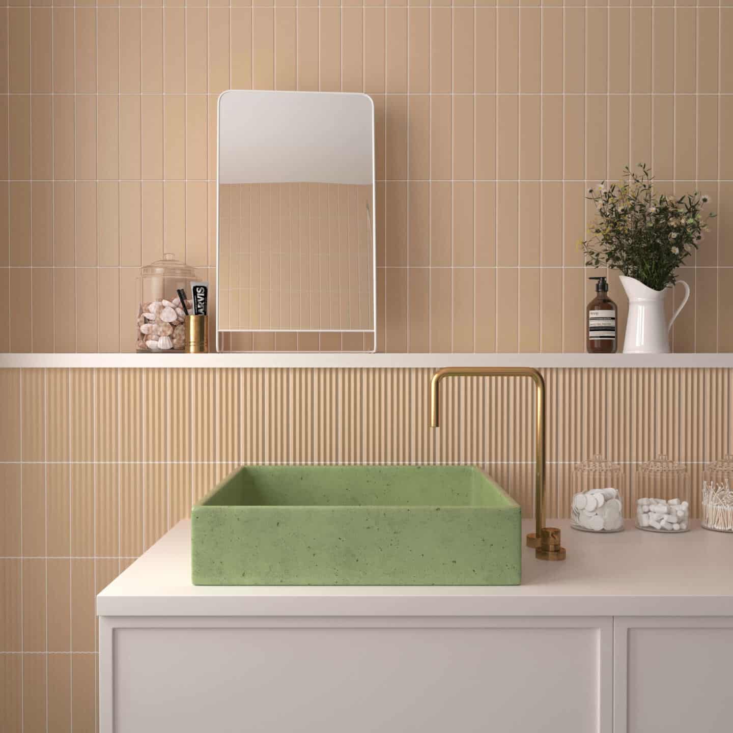 A bathroom featuring tiles in Pantone colour of the year 2024 Peach Fuzz