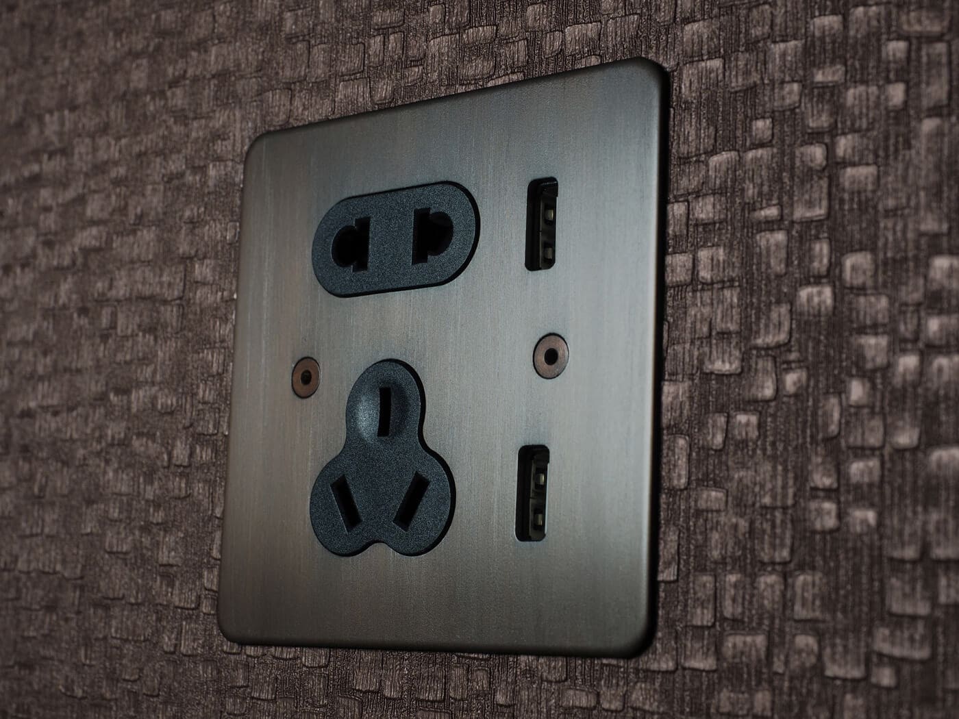 A close up of a plug socket that has usb sockets