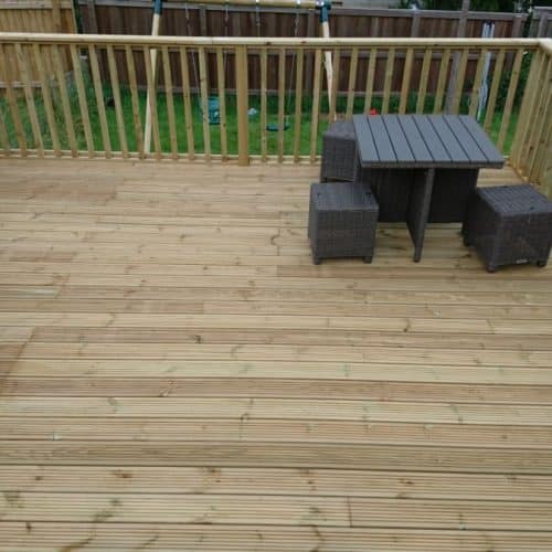 Garden Decking Makeover featuring a raised deck with balustrade