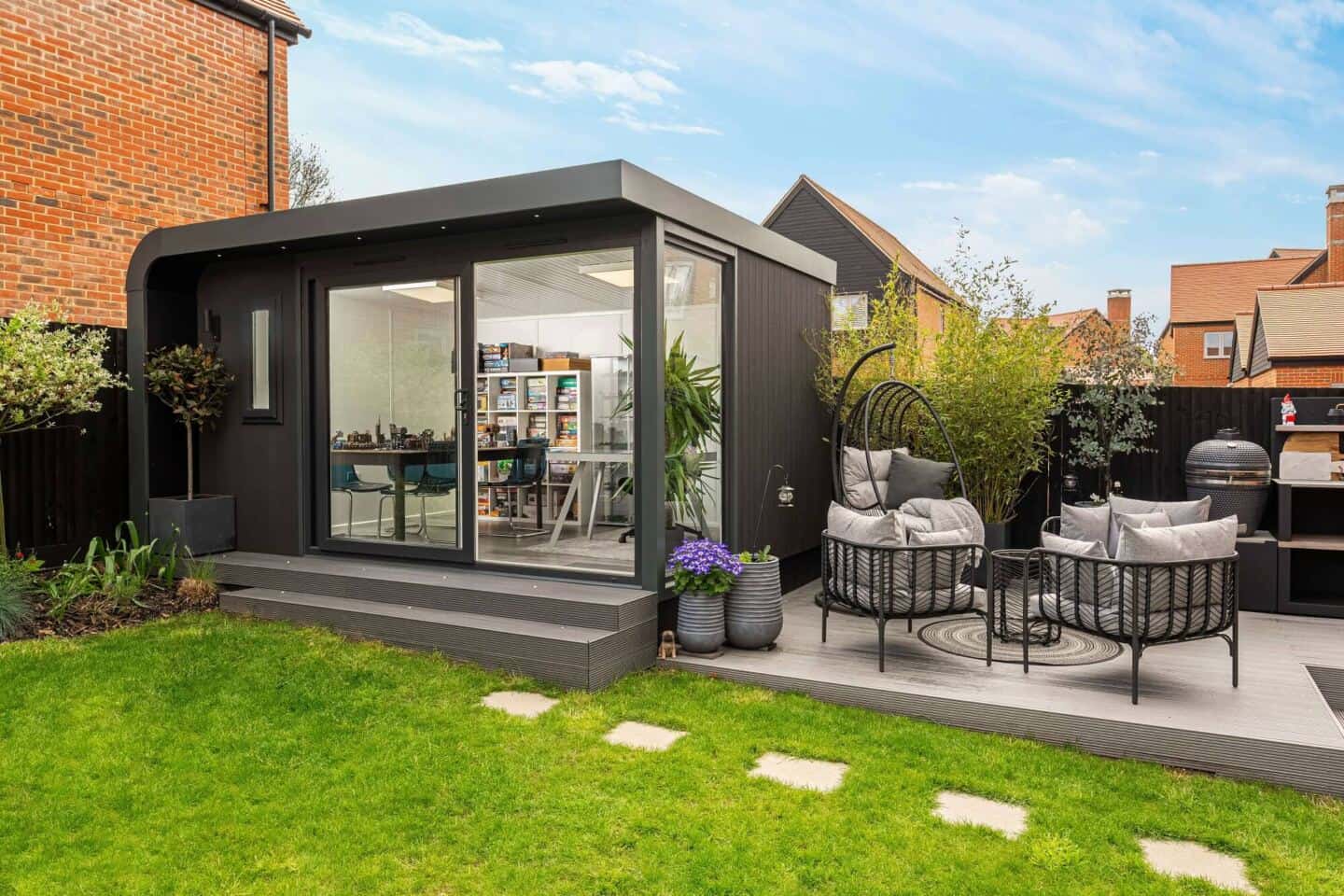 A garden room next to some decking