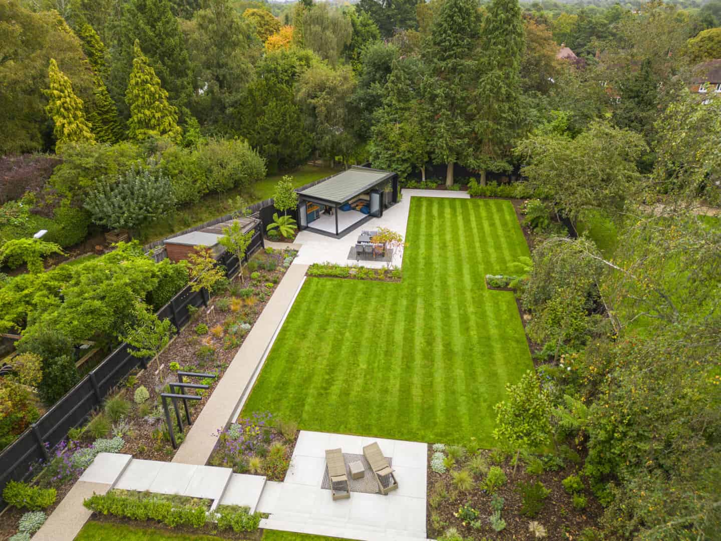 riel view of a large garden featuring a garden room