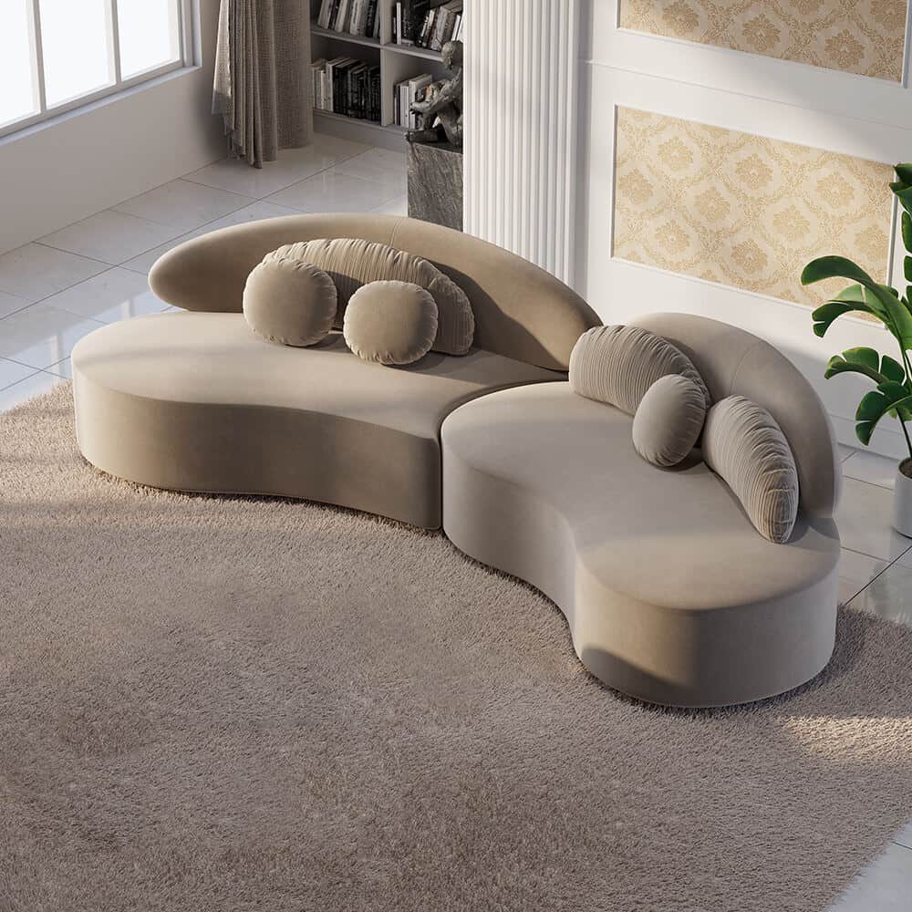 modern curved sectional modular sofa on a shaggy beige rug