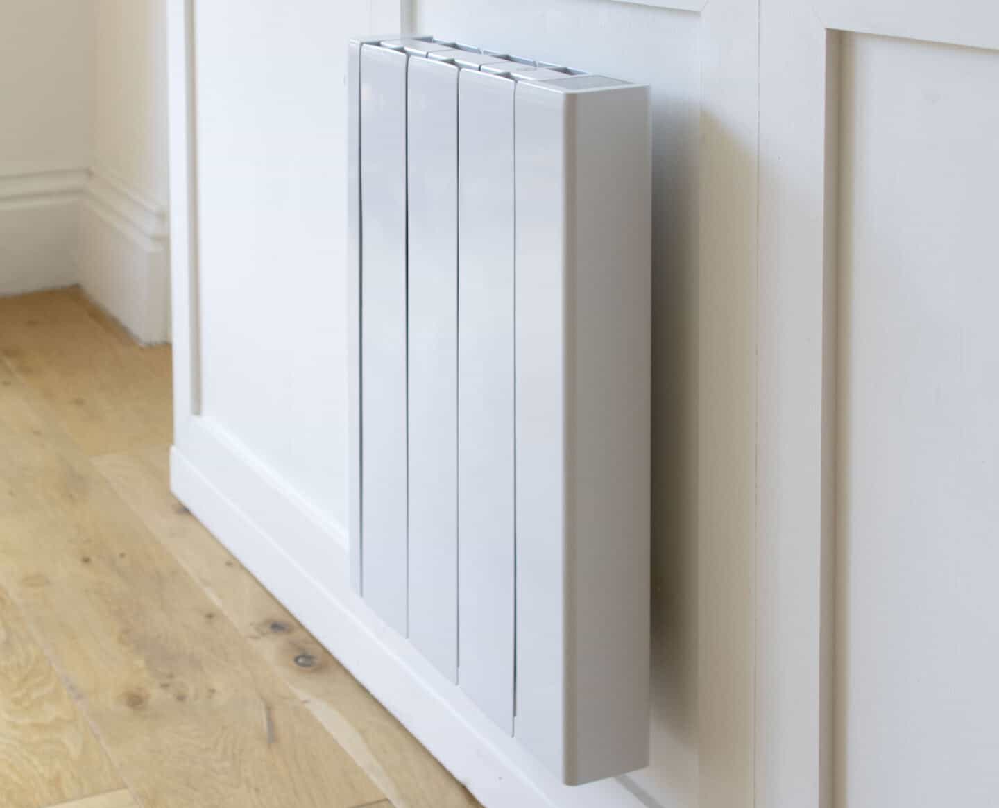 The Ecostrad iQ Ceramic radiator mounted on a white wall