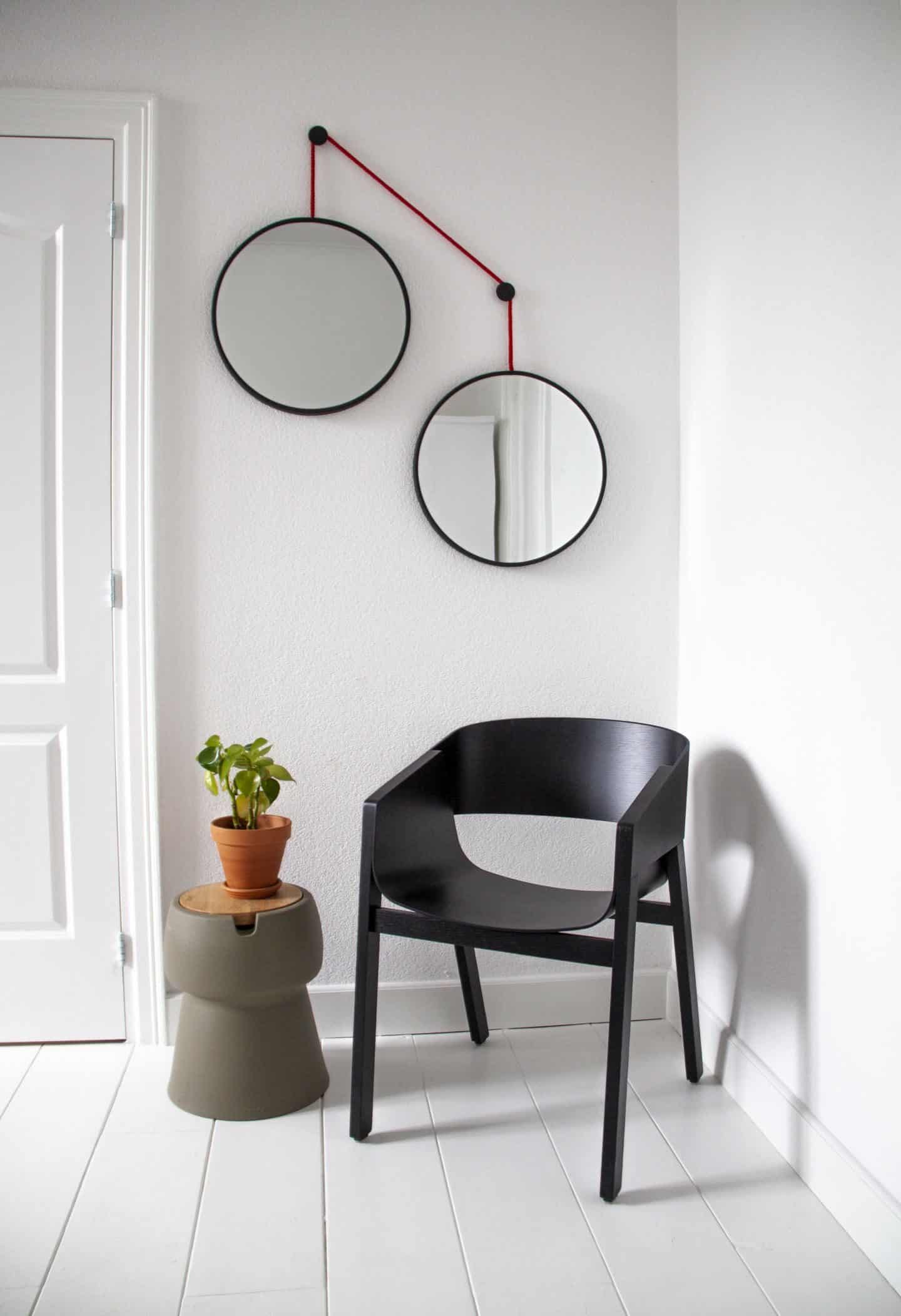 Dutch design brand Jokjor Twins hanging cantilevered round mirror set