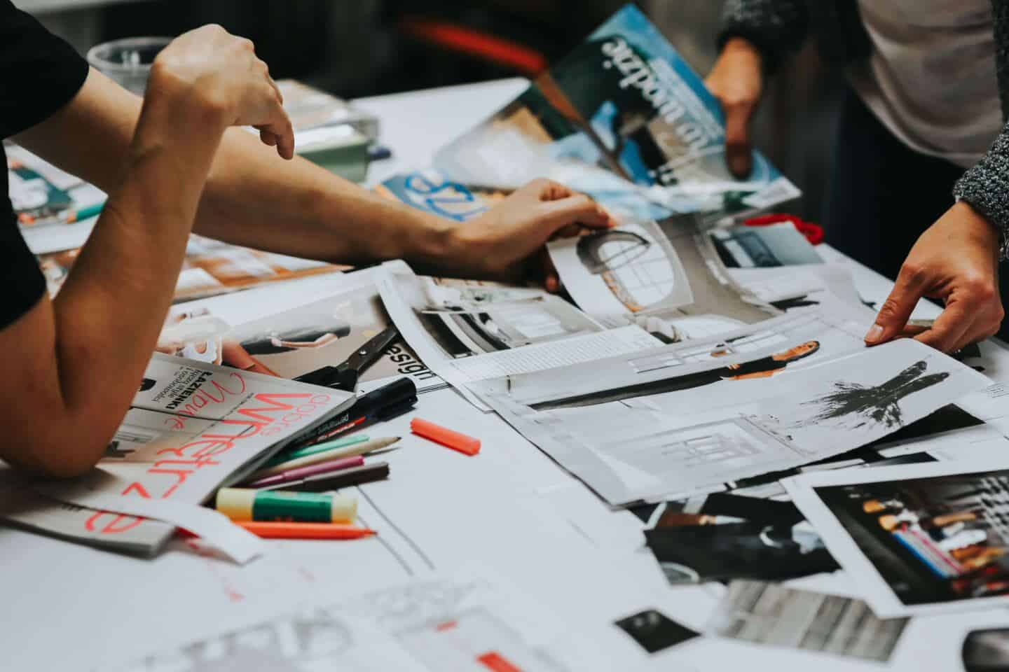 Two women creating mood boards for a home renovation project