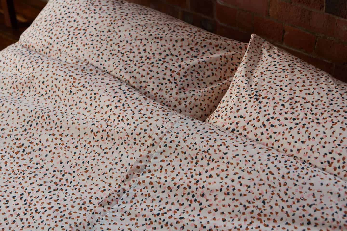 Koa revolutionary duvet cover. A close-up of the exclusive pattern designed by Kitty McCall. The easy way to change a duvet cover