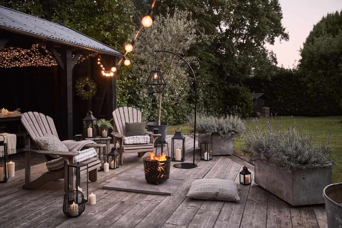 Garden oasis with decking and lighting