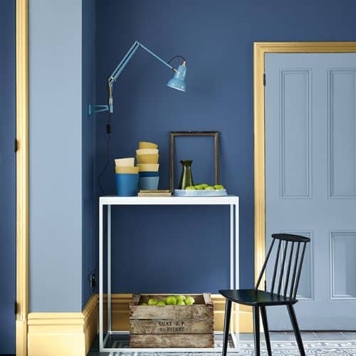 Little Greene Paint - Blue room with yellow coloured skirting board