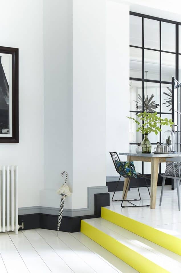 Little Greene Paint - Hallway-Diner with black & grey coloured skirting board and yellow stair risers