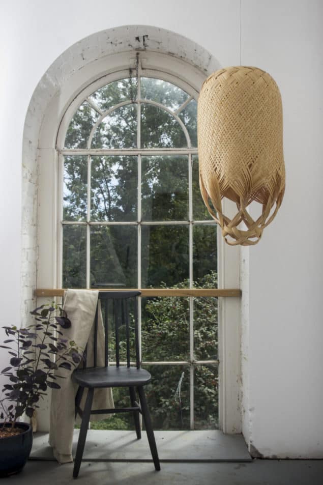 Pren Lighting by Louise Tucker suspended in front of a window