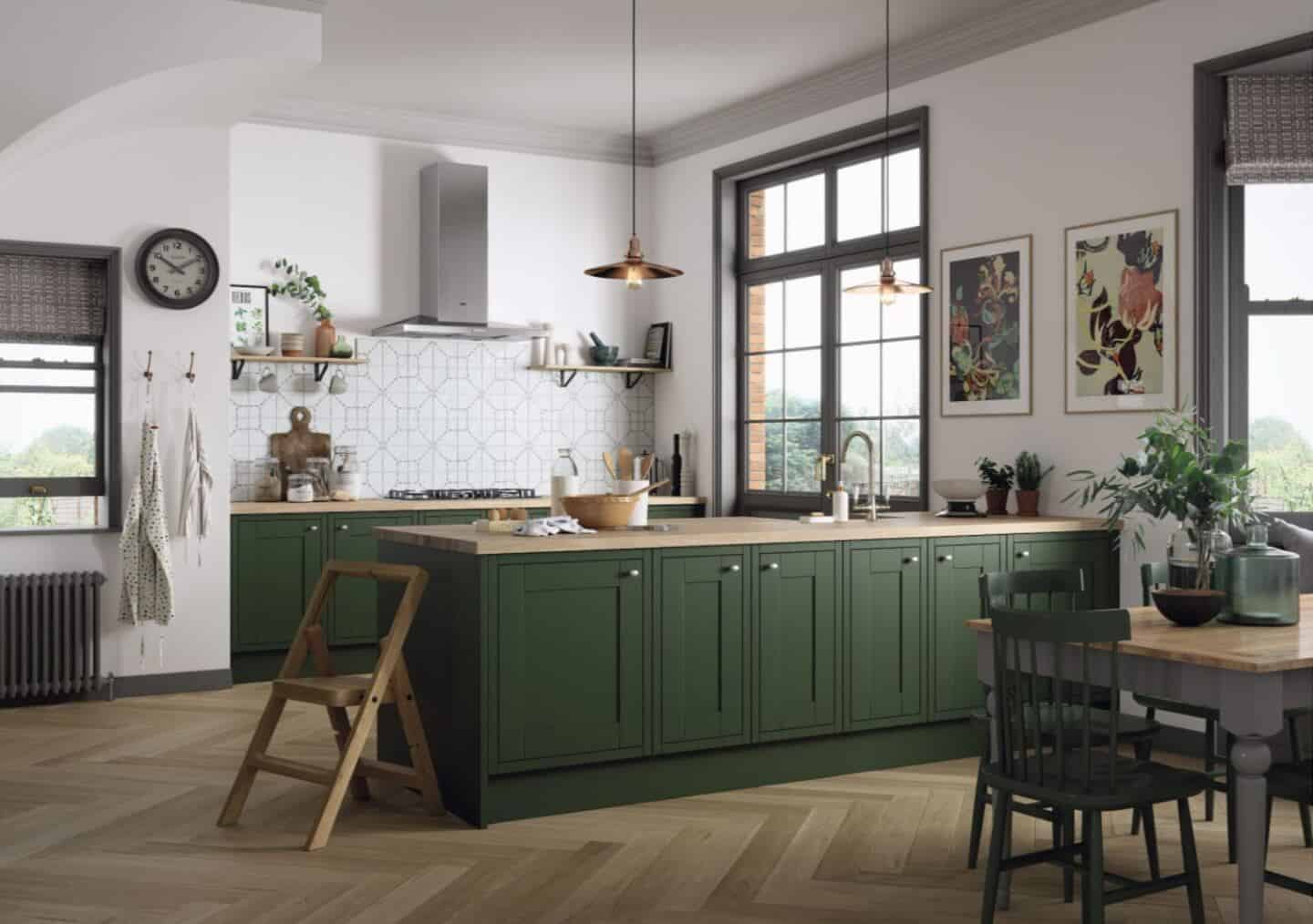 MAgnet's Somerton Kitchen in Forest Walk with a wooden worktop. Natural light floods in fom two large windows.