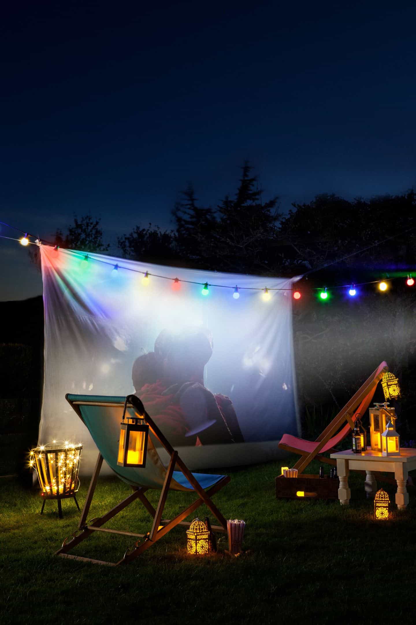 An outdoor movie screening in the perfect activity for your summer staycation in your garden