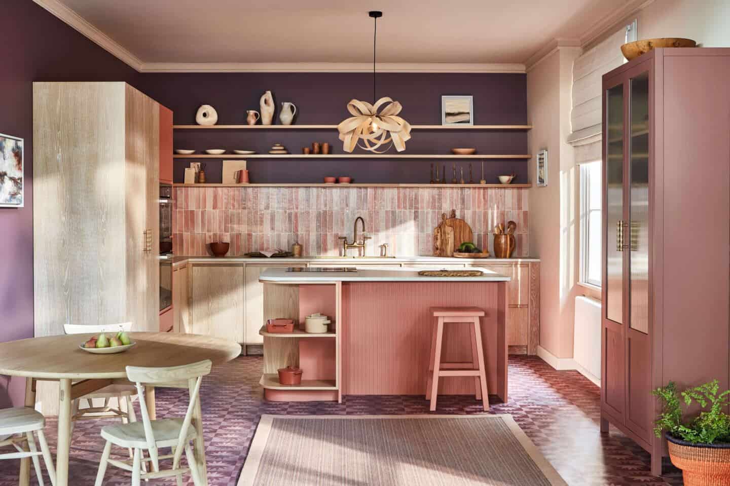 A beautiful pink, peach and purple kitchen from Naked kitchens