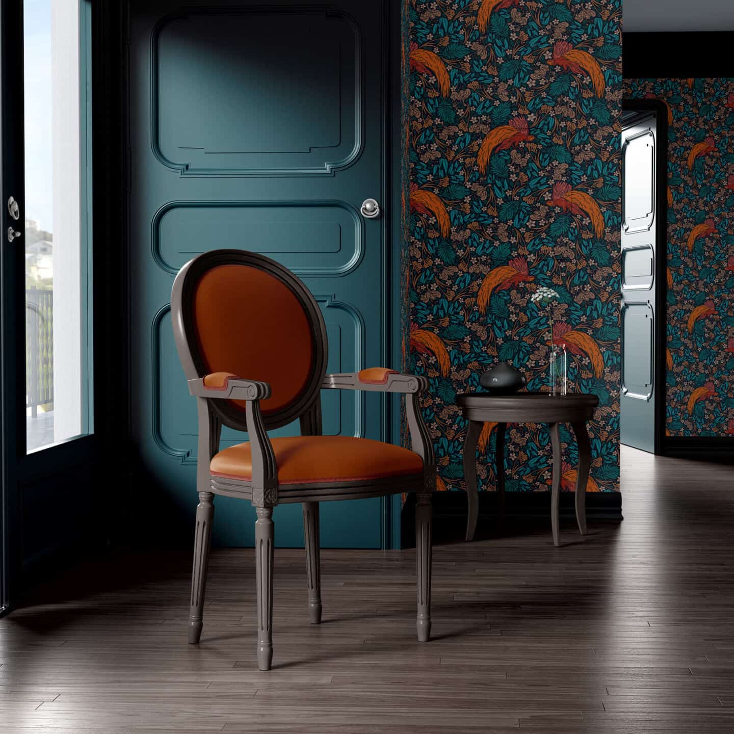 A beautiful teal and orange botanical wallpaper in a room with wooden floors. An open door is on the right and a closed door is on the left behind an upholstered orange chair.