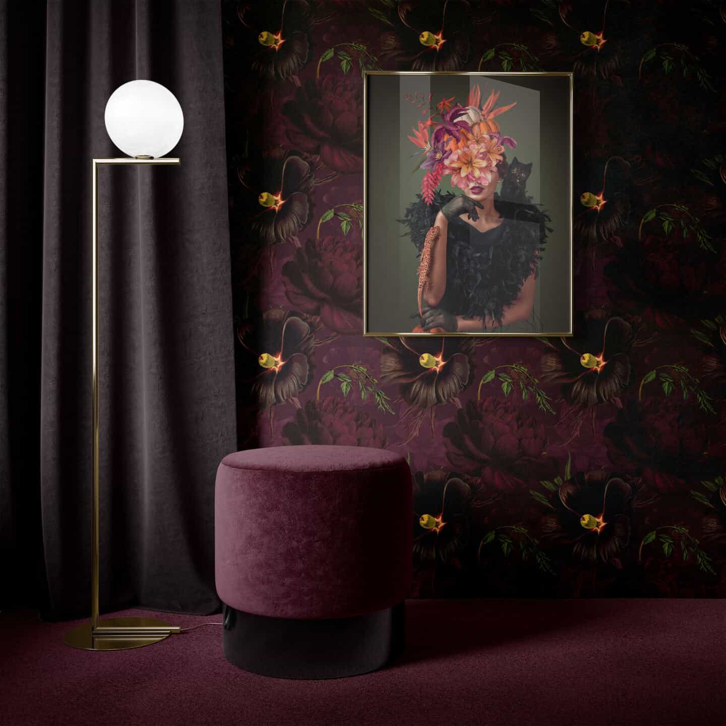 A deep purple botanical wallpaper with a purple carpet and purple pouffe in front. An image of a woman with a cat n her shoulder and a lizard ion her arm with flowers obscurring her face hangs on the wall.