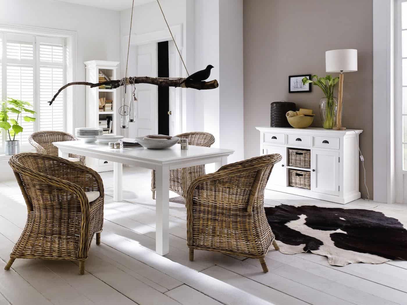 New Nordic interior featuring white furniture, rattan furniture neutral walls and rattan baskets. Furniture from the Halifax range from Novasolo