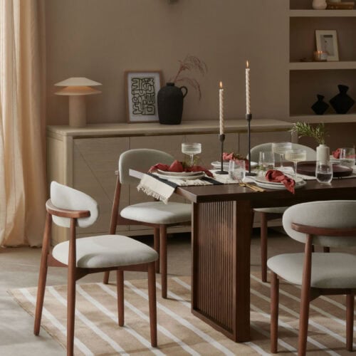 A dining table laid up in a minimalist japandi dining room