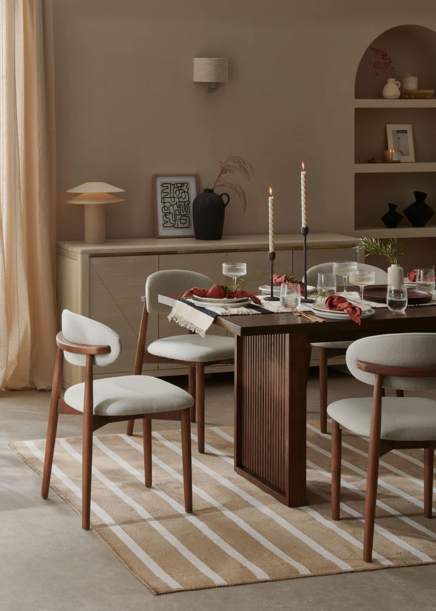 A dining table laid up in a minimalist japandi dining room