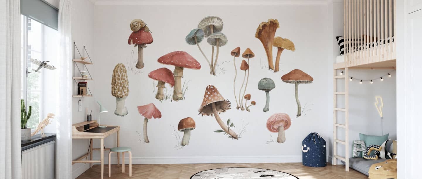 A large wall mural featuring woodland mushrooms on a white background in a child's bedroom