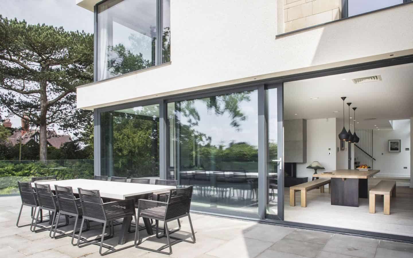 Pilkington Glass - Large glazed sliding doors from dining room out to garden