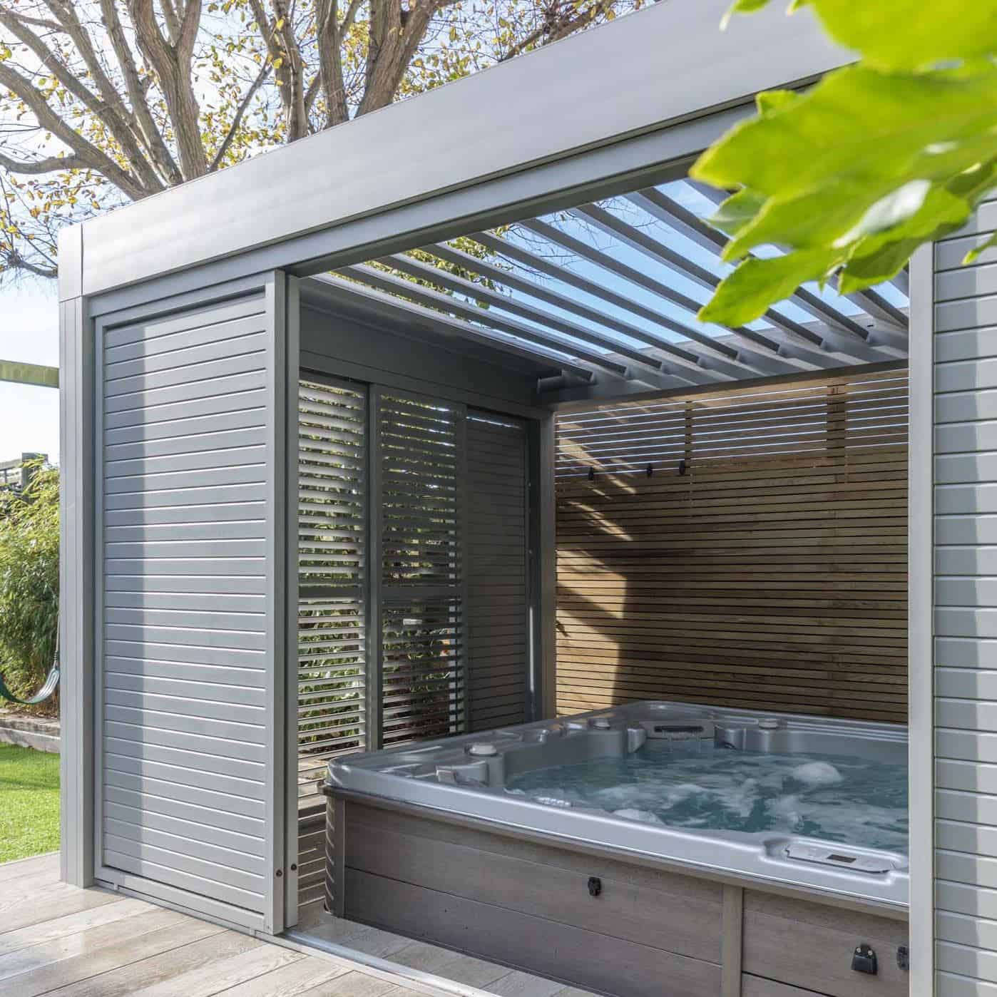 An undercover hot tub brings spa vibes to your summer staycation in your garden