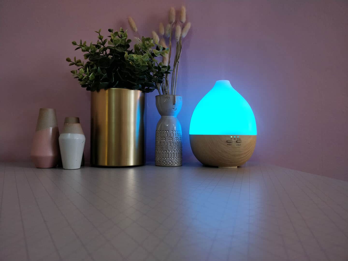 Smellacloud aroma diffuser with the blue LED light illuminated